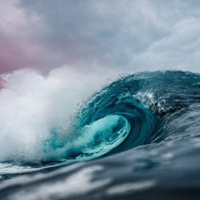 large tidal wave crashing