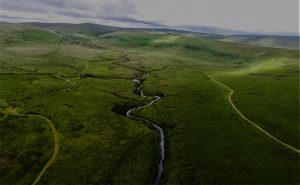 river running through valley